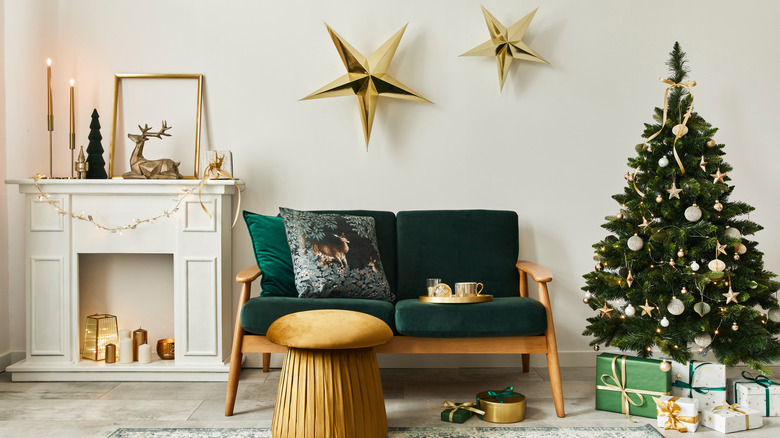 gold stars above green couch