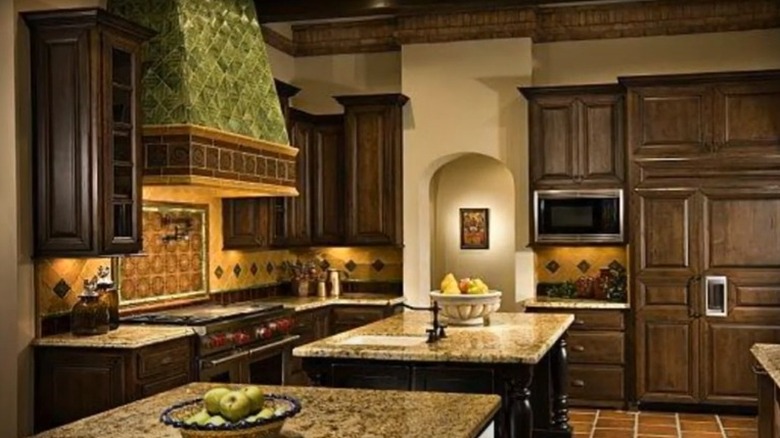 kitchen with green hood range accents