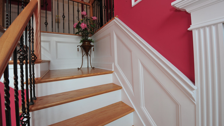white wainscoting staircase wall