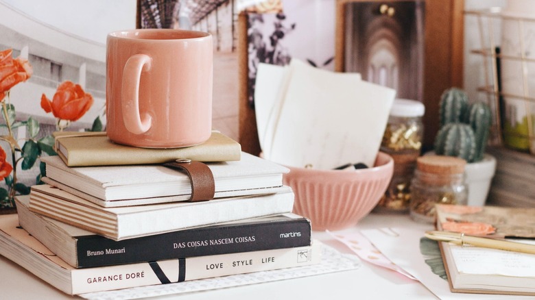 pink mug on desk