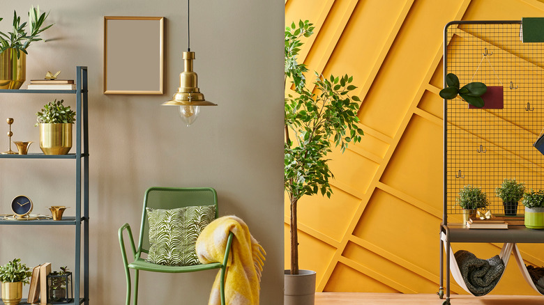 bookshelf with plants on it and next to it