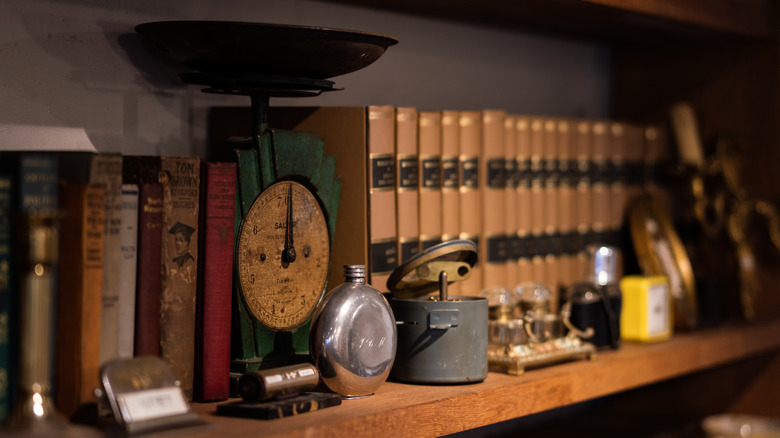 bookshelf with antiques 