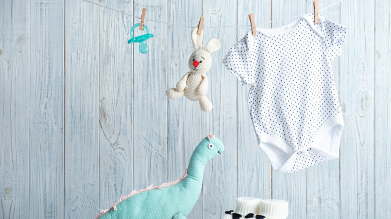 baby clothesline with stuffed animals