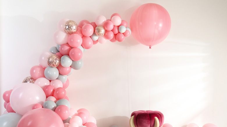 pink balloon arch in home