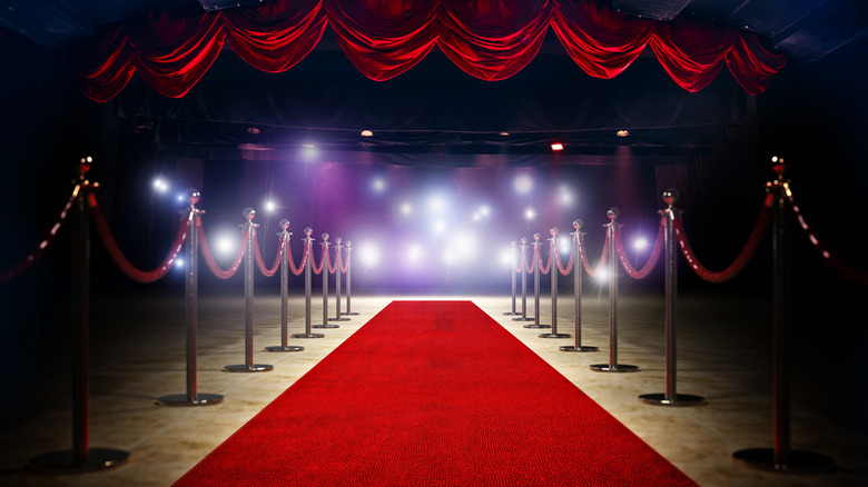 red carpet event with curtain