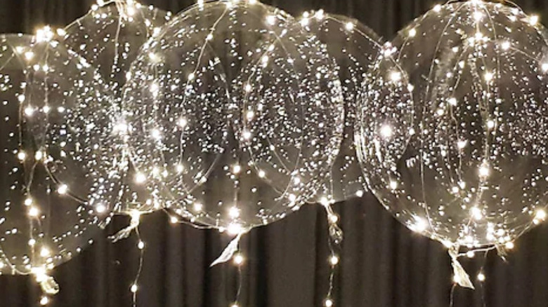 silver balloons filled LED lights