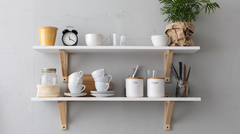 open kitchen shelving with cups