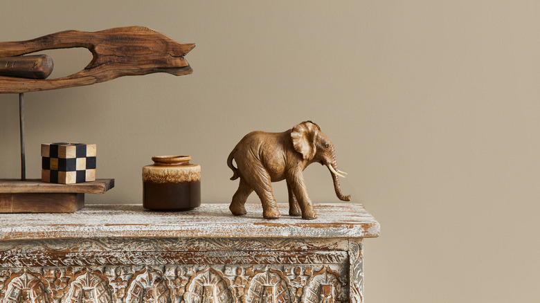 shelf with wooden carved antiques