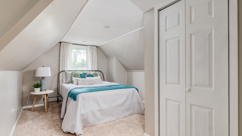 bedroom with slanted ceilings