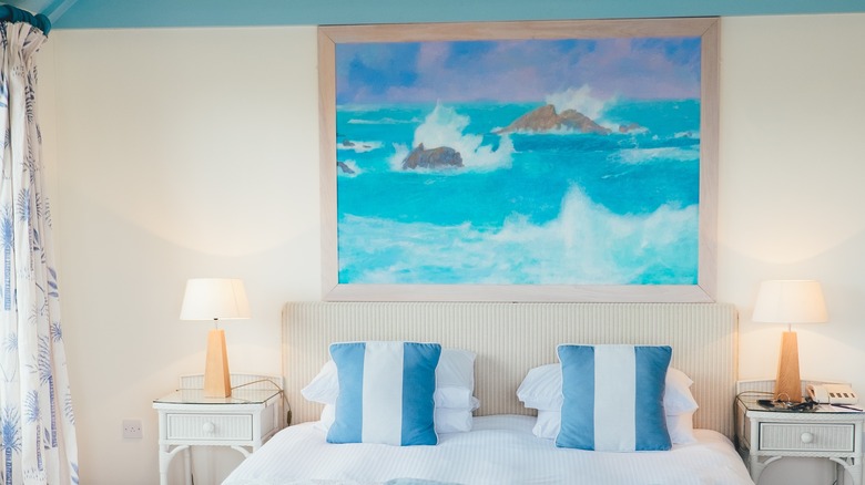 coastal bedroom with wall art