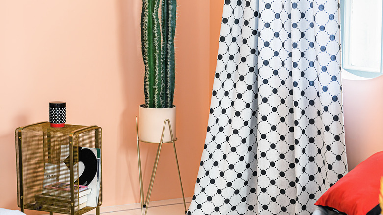 Polka dotted curtains pink room