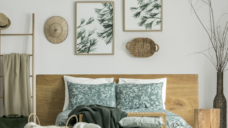 baskets and pictures above bed