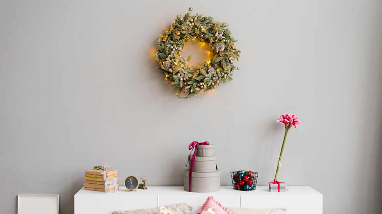 wreath hanging above the bed