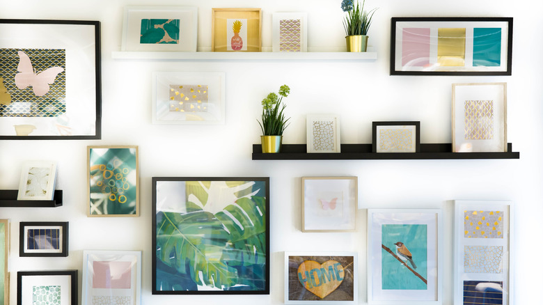 gallery wall with art and shelves
