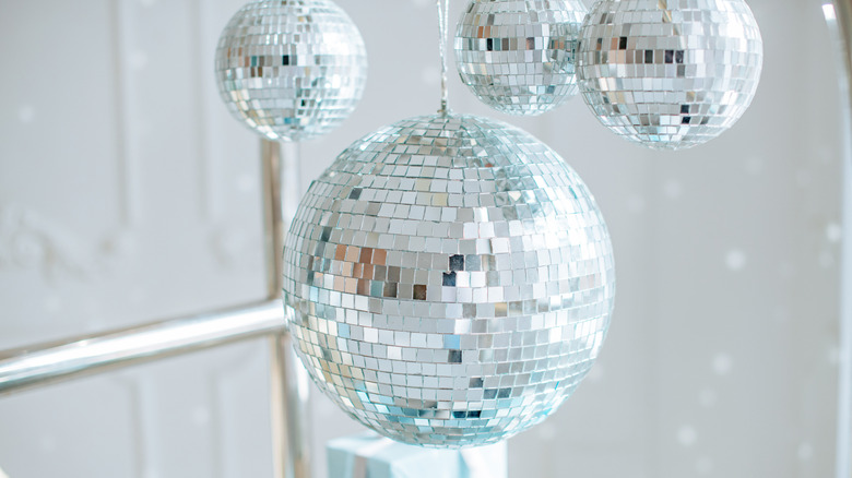 disco balls hung up in room as decoration