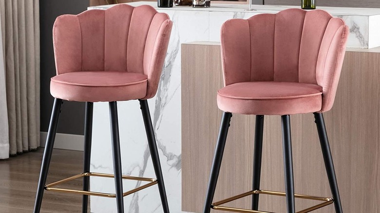 pink bar stools in home