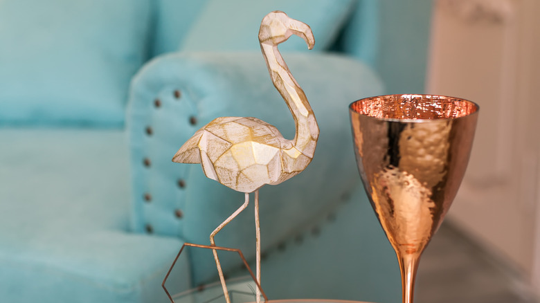 flamingo ornament on table