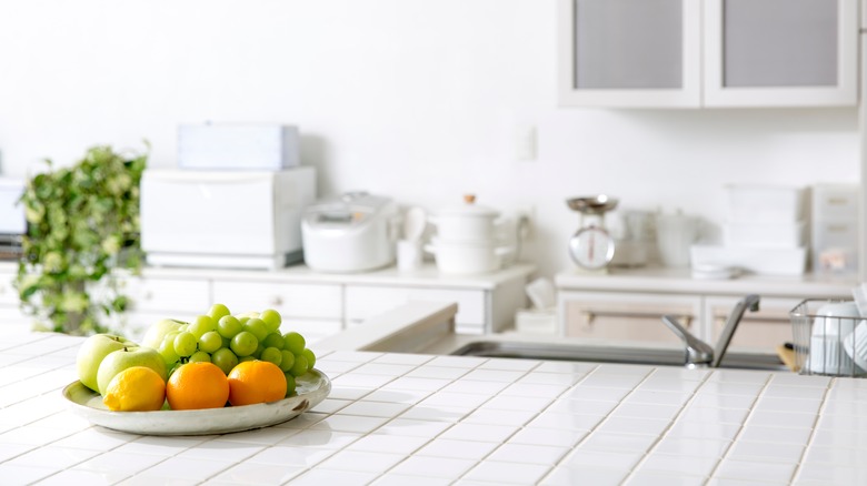 Fruits on plate white kitchen