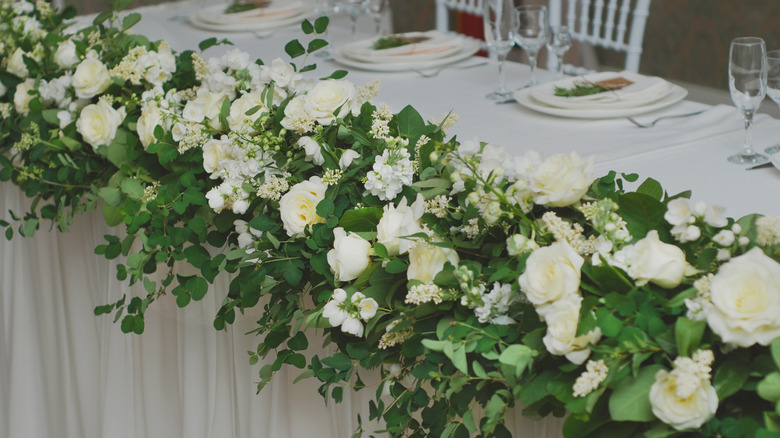 White flowers and leaves centerpiece 