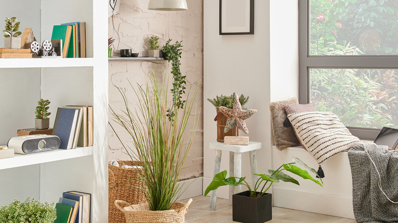 white stool with decor in corner 