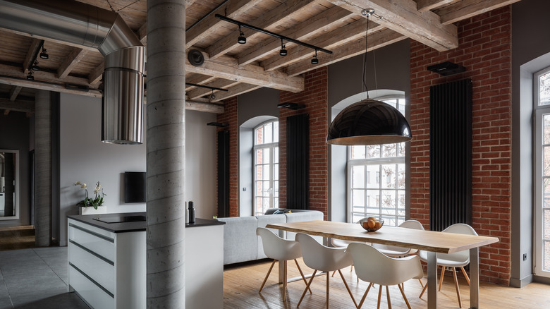 modern room with wooden pallet ceiling