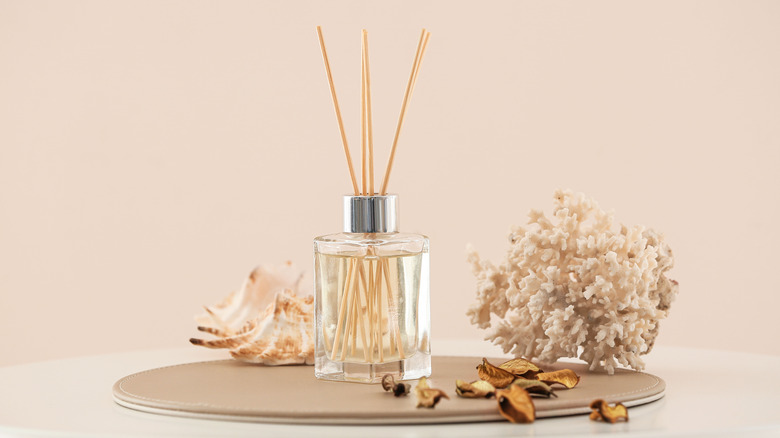 reed diffuser on tray