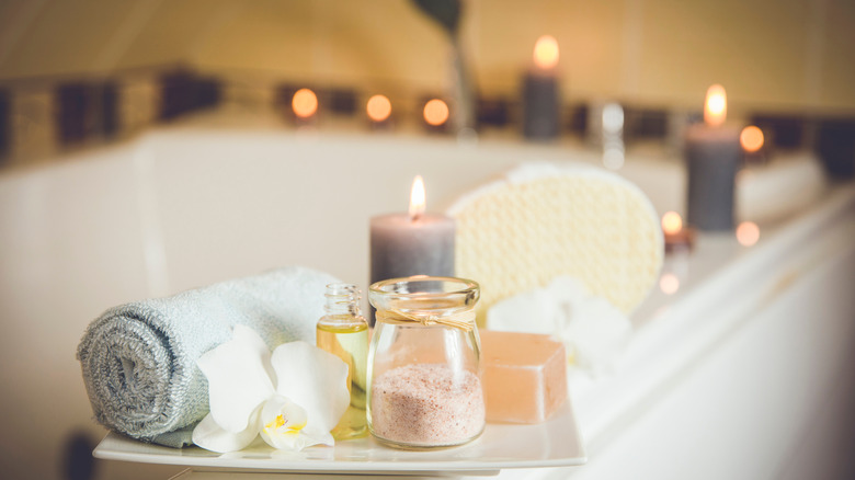 bathtub surrounded by candles