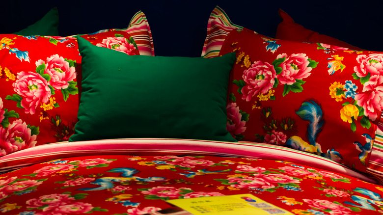Bed with bold red bedding