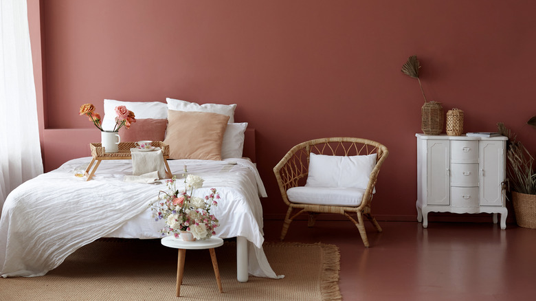 pink bedroom with white bed