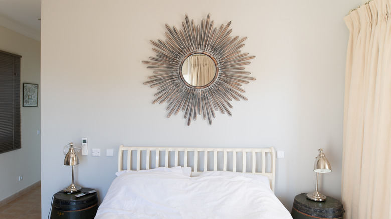 Sunburst mirror in bedroom