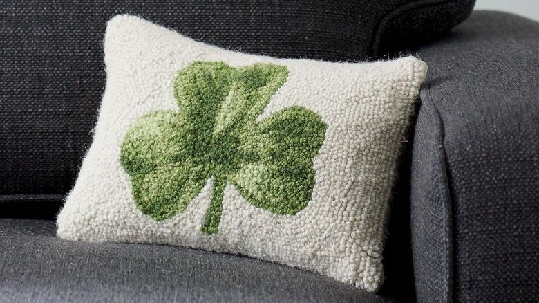 Throw pillow with shamrock designs 