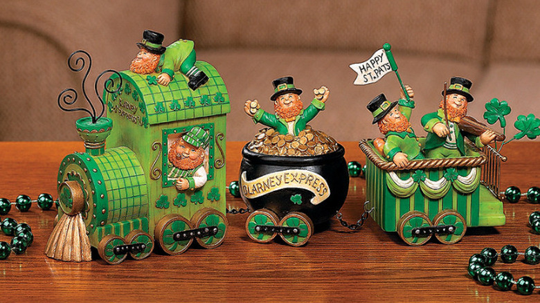 Leprechaun figurines in gold pot