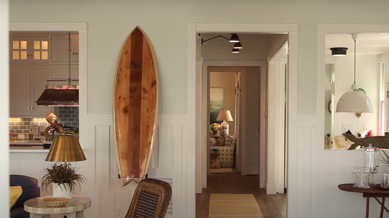 surfboard hanging on wall