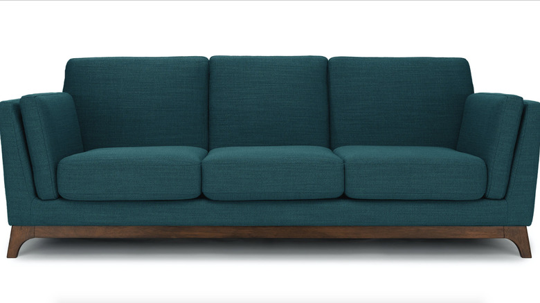 Crulean-colored couch from Article