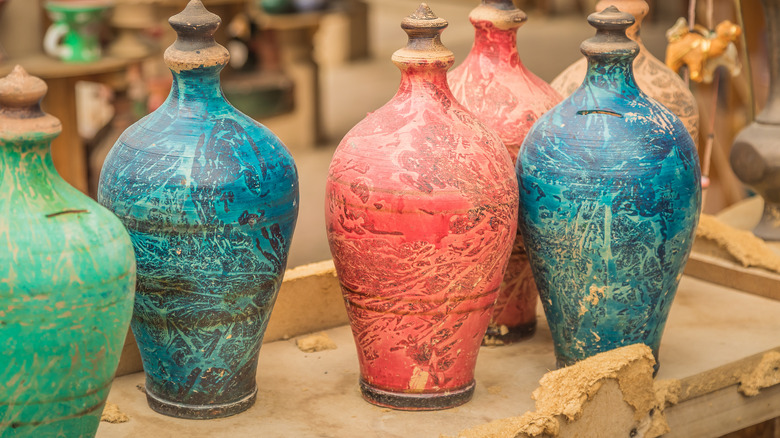 bunch of tall and colorful vases 
