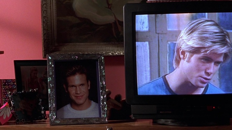 bedazzled photo frames on dresser 