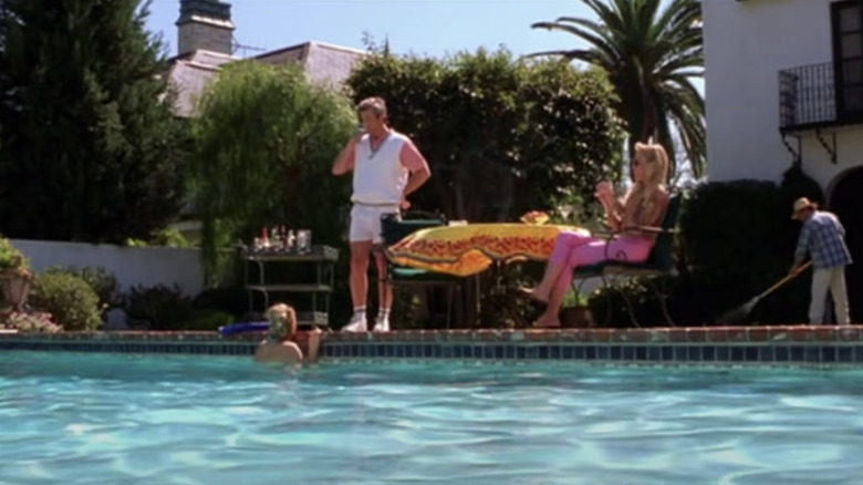 Elle Woods swimming in pool