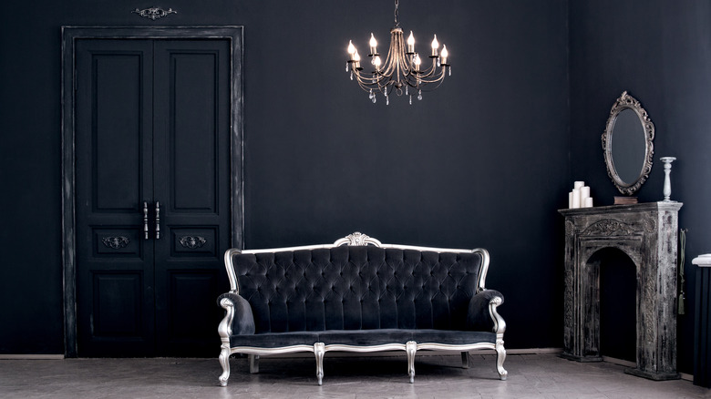 black room with vintage furniture 