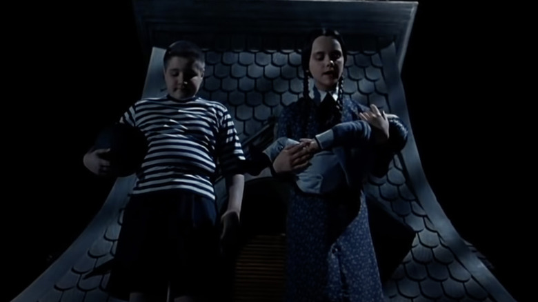 Wednesday and Pugsley Addams on the roof