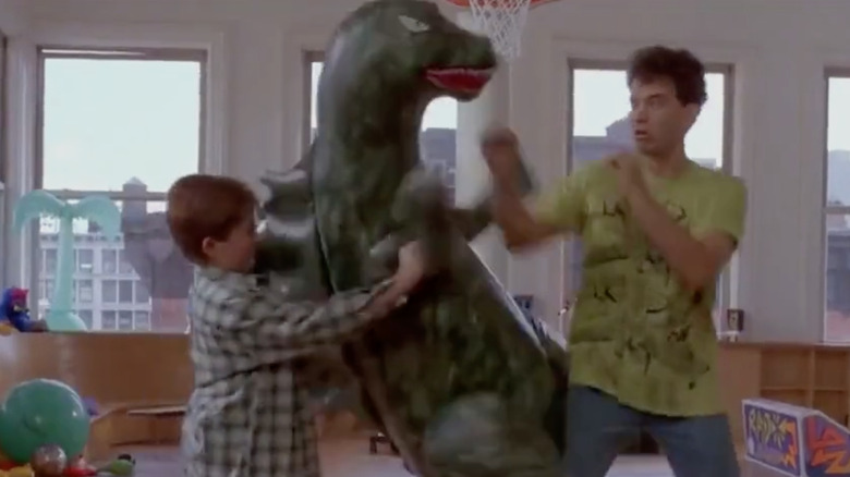 Josh punches a dinosaur