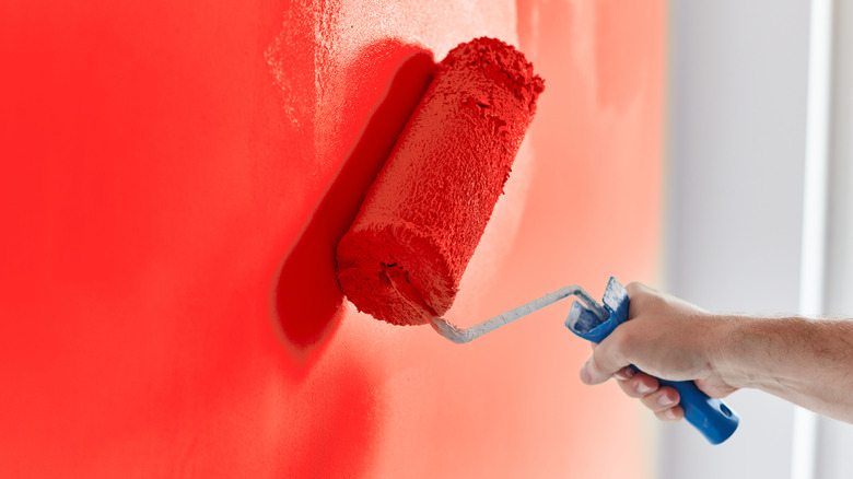 red wall being painted 