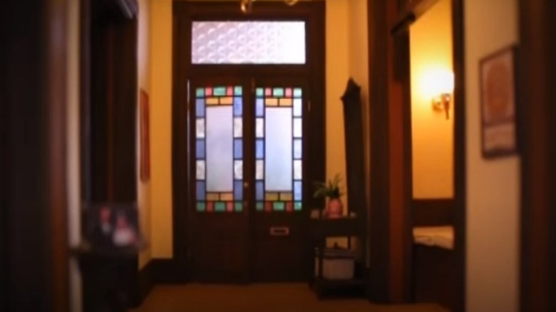 foyer with stained glass door