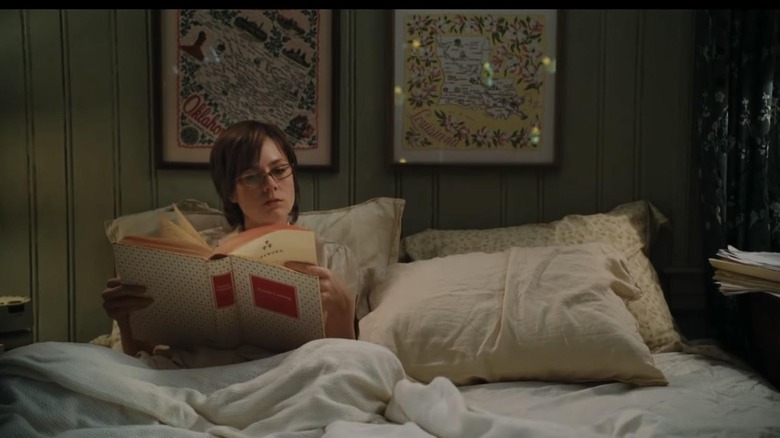 Julie reading book in bed