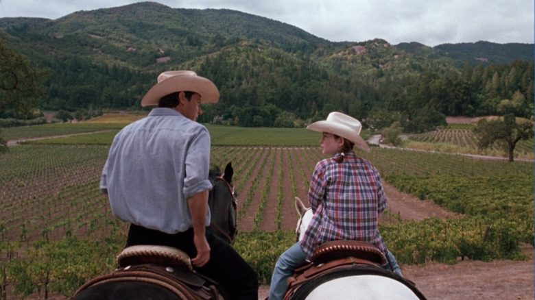 Nick and Hallie riding horses