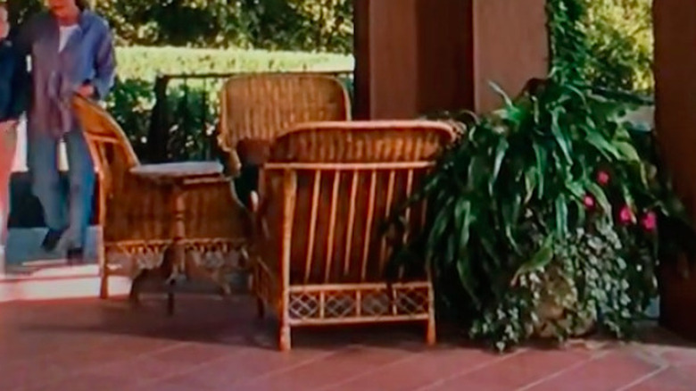 rattan chairs around table