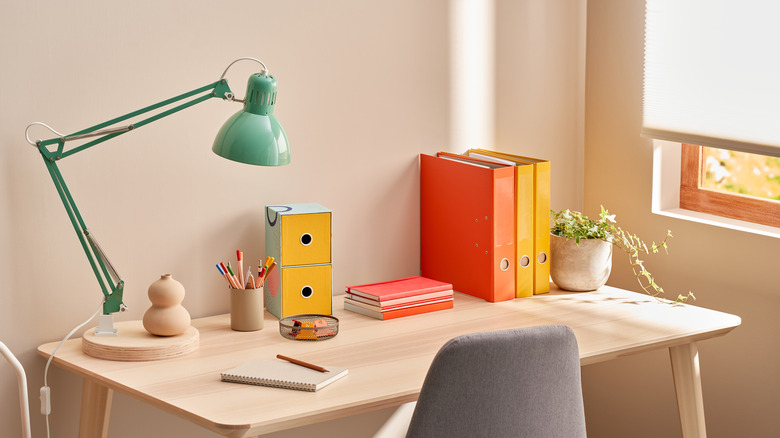 colorful desk with binders