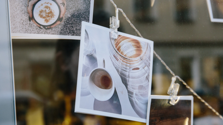 Polaroid pictures clipped on string