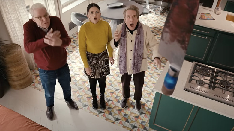 Charles, Mabel, and Oliver in the kitchen 