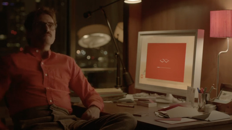 Man sitting at computer desk