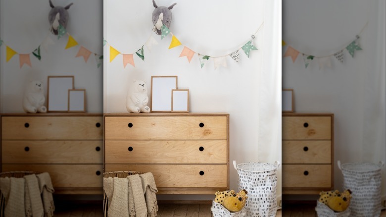 wooden dresser in nursery